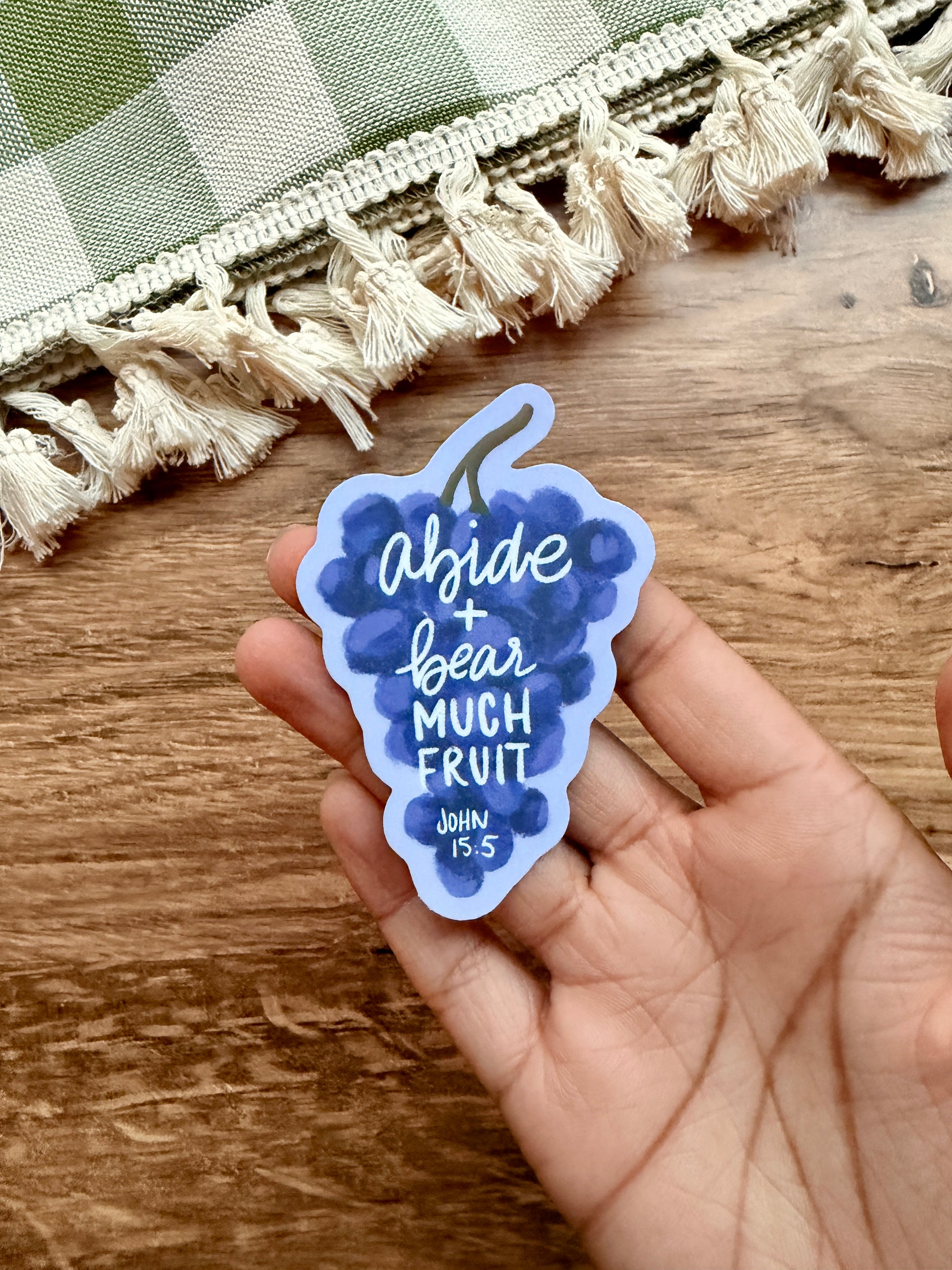 Abide and Bear Much Fruit matte vinyl sticker in the shape of grapes with a Bible verse reference.